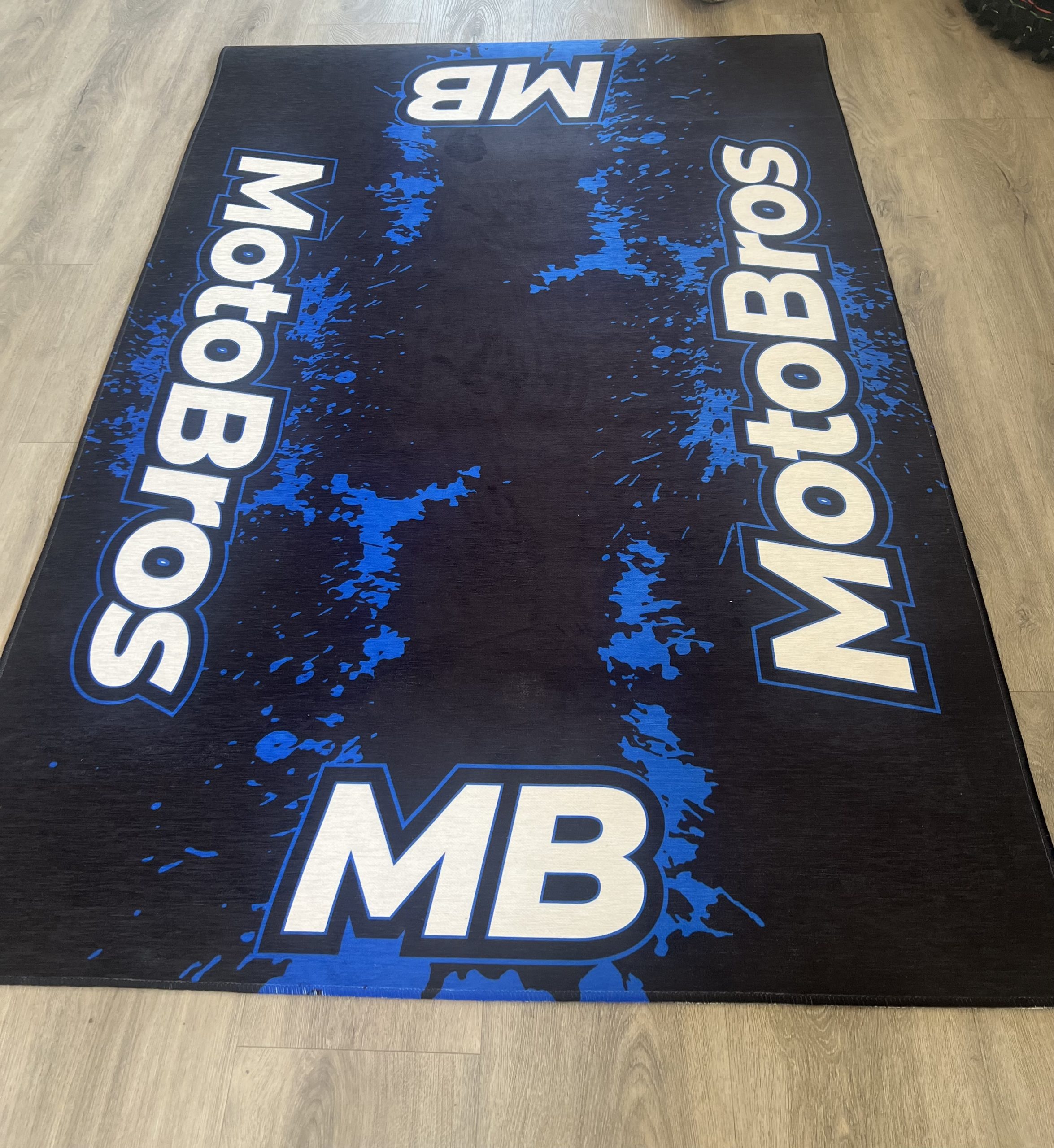 Dye-sublimation printing of a custom logo mat during real production