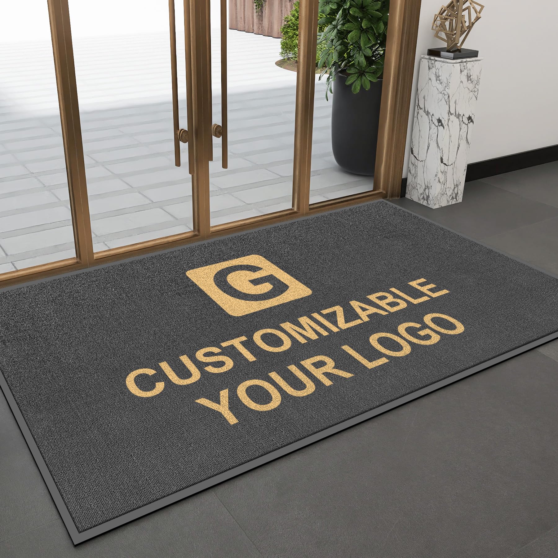 Custom-branded commercial entrance mat laid at a customer arrival path